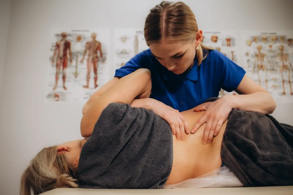 senior woman at a physiotherapist appointment